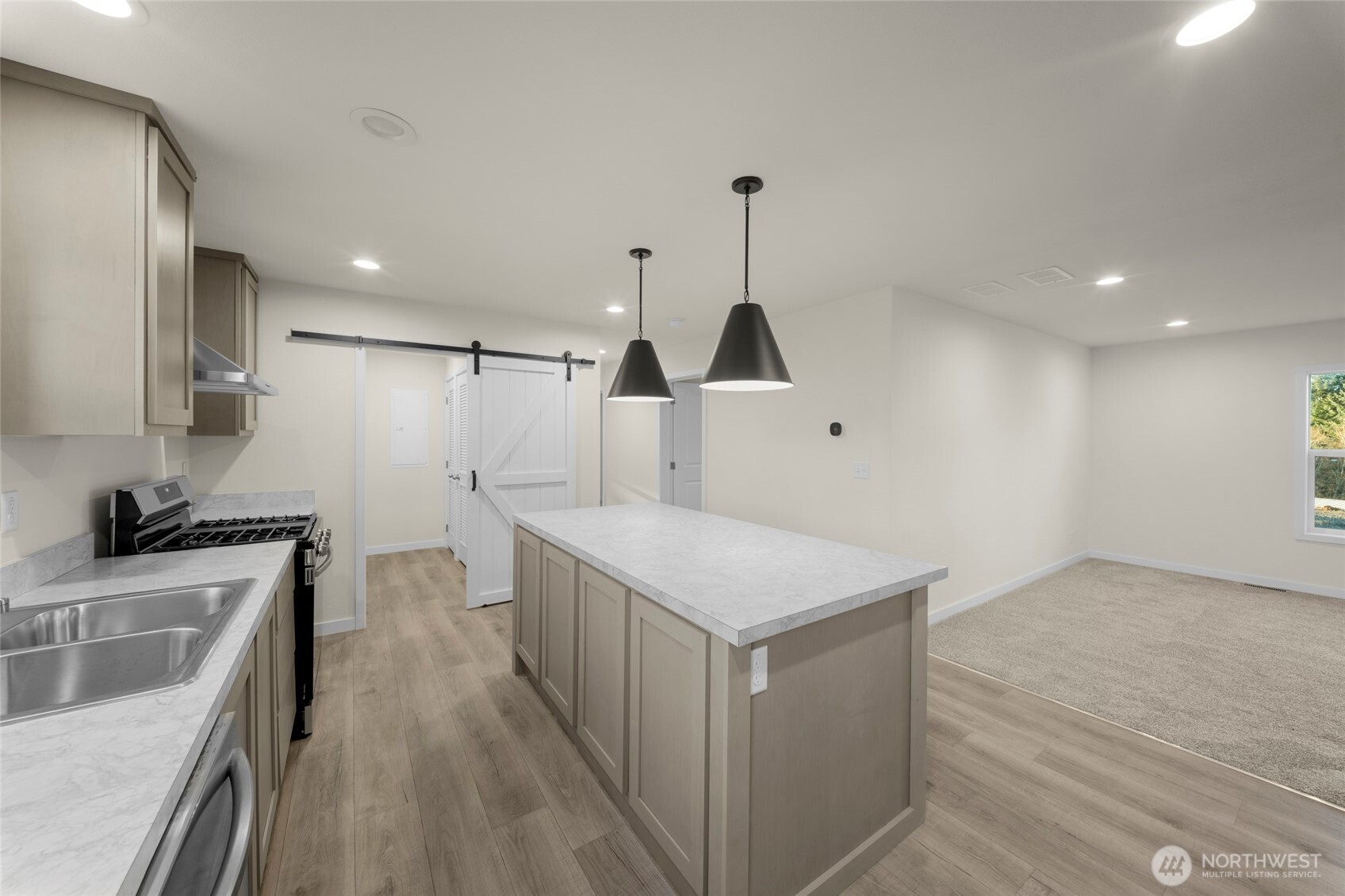 200 Lot C Fineview Chehalis, WA 98532 - Photo 14 of 36 a kitchen that has a sink a stove and a wooden floor