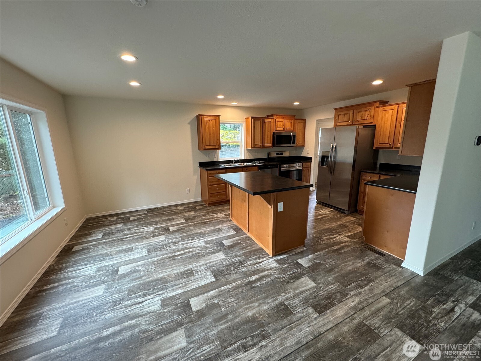 200 Lot C Fineview Chehalis, WA 98532 - Photo 19 of 31 a kitchen with stainless steel appliances granite countertop a stove a sink and a refrigerator