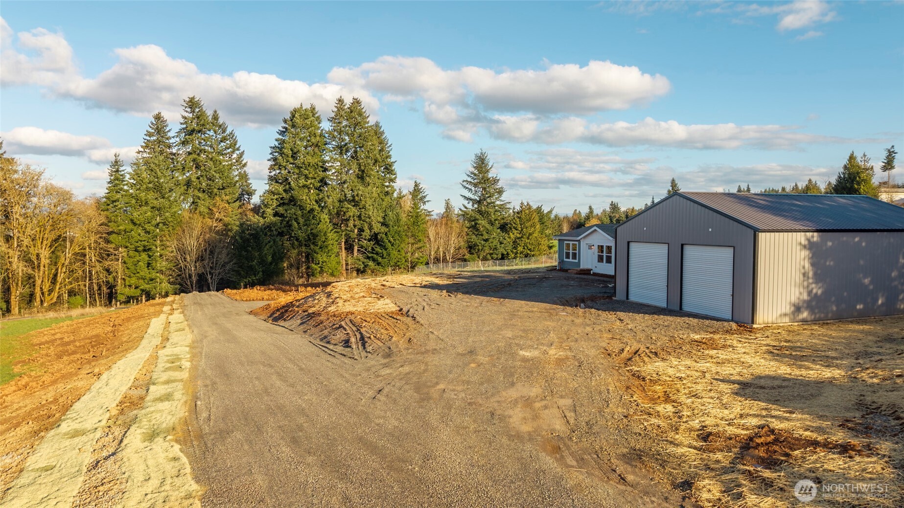 200 Lot C Fineview Chehalis, WA 98532 - Photo 34 of 36 a view of large house with a yard and wooden fence