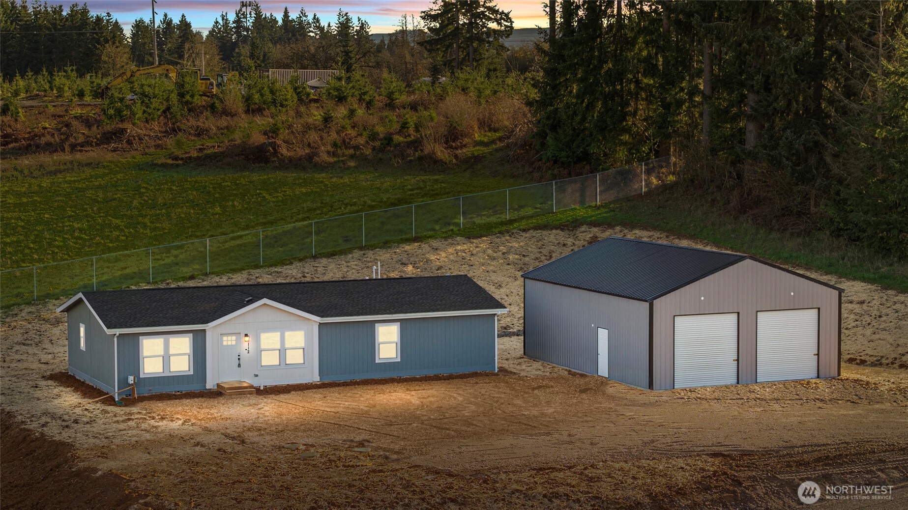 200 Lot C Fineview Chehalis, WA 98532 - Photo 4 of 36 a front view of a house with a yard and garage