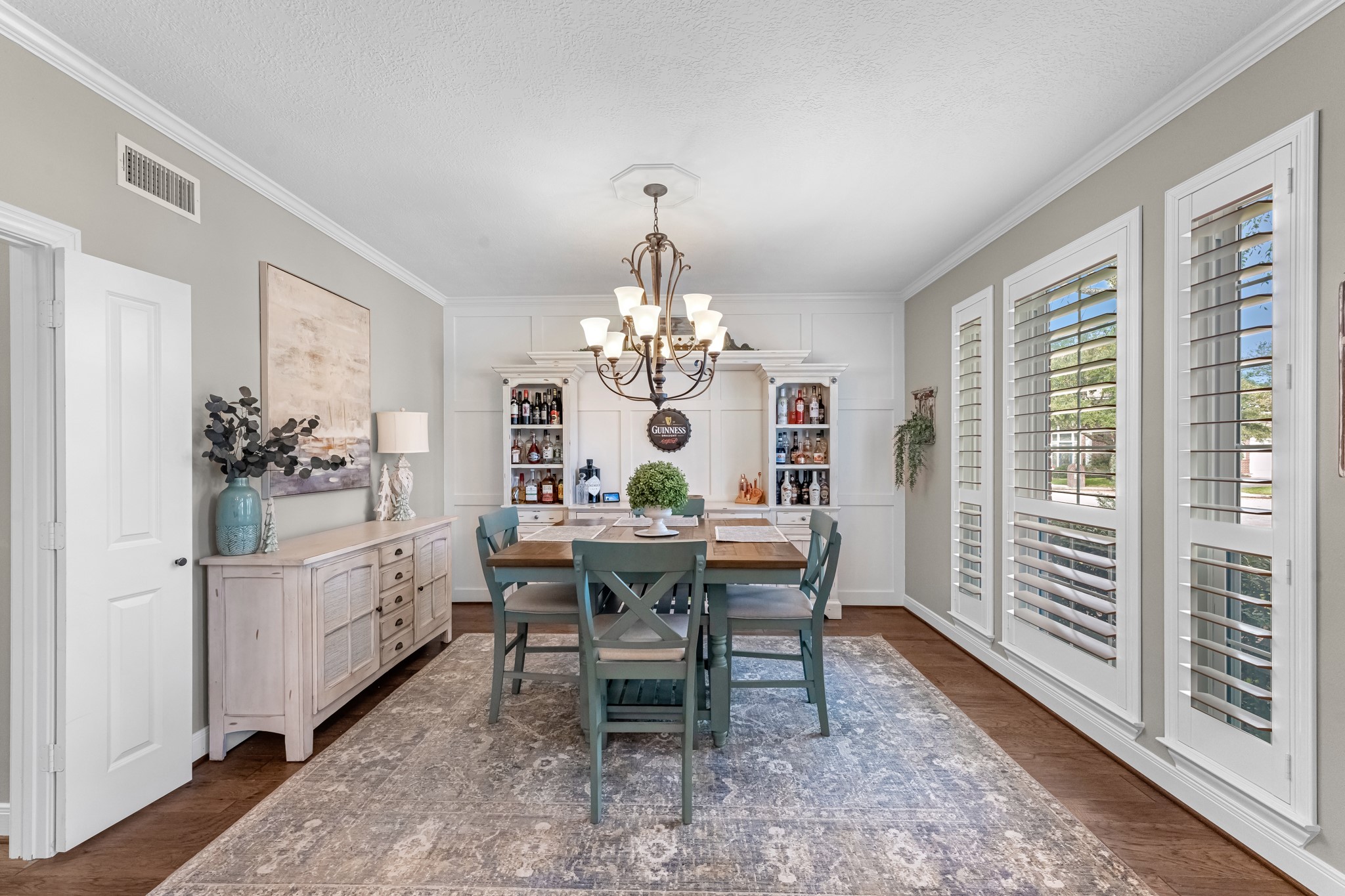 16207 Lafone Drive Spring, TX 77379 - Photo 12 of 49 a view of a dining room with furniture window and wooden floor