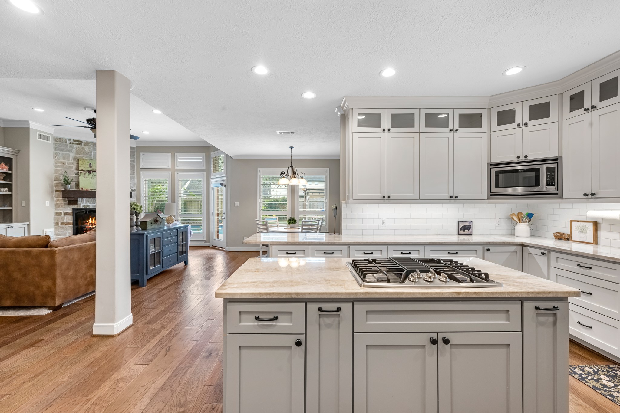 16207 Lafone Drive Spring, TX 77379 - Photo 20 of 49 a kitchen with a stove a sink and a refrigerator