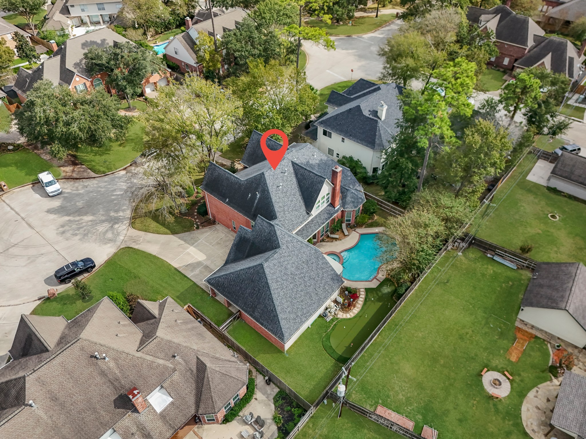 16207 Lafone Drive Spring, TX 77379 - Photo 2 of 49 an aerial view of a house with a garden and swimming pool
