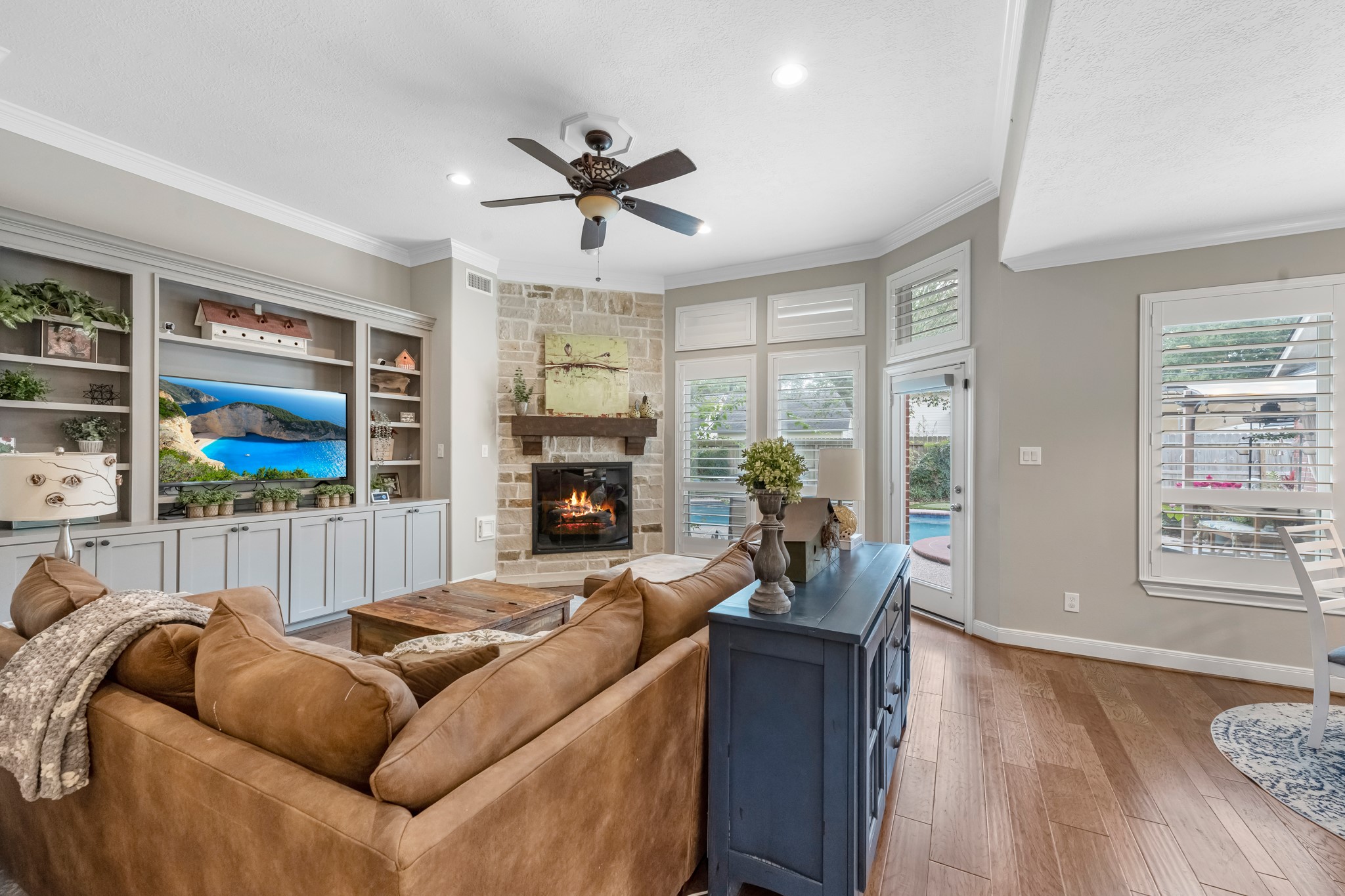 16207 Lafone Drive Spring, TX 77379 - Photo 23 of 49 a living room with furniture and a fireplace