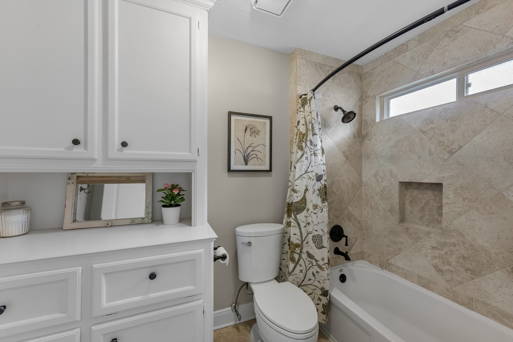 16207 Lafone Drive Spring, TX 77379 - Photo 41 of 49 a bathroom with a toilet a sink and bathtub