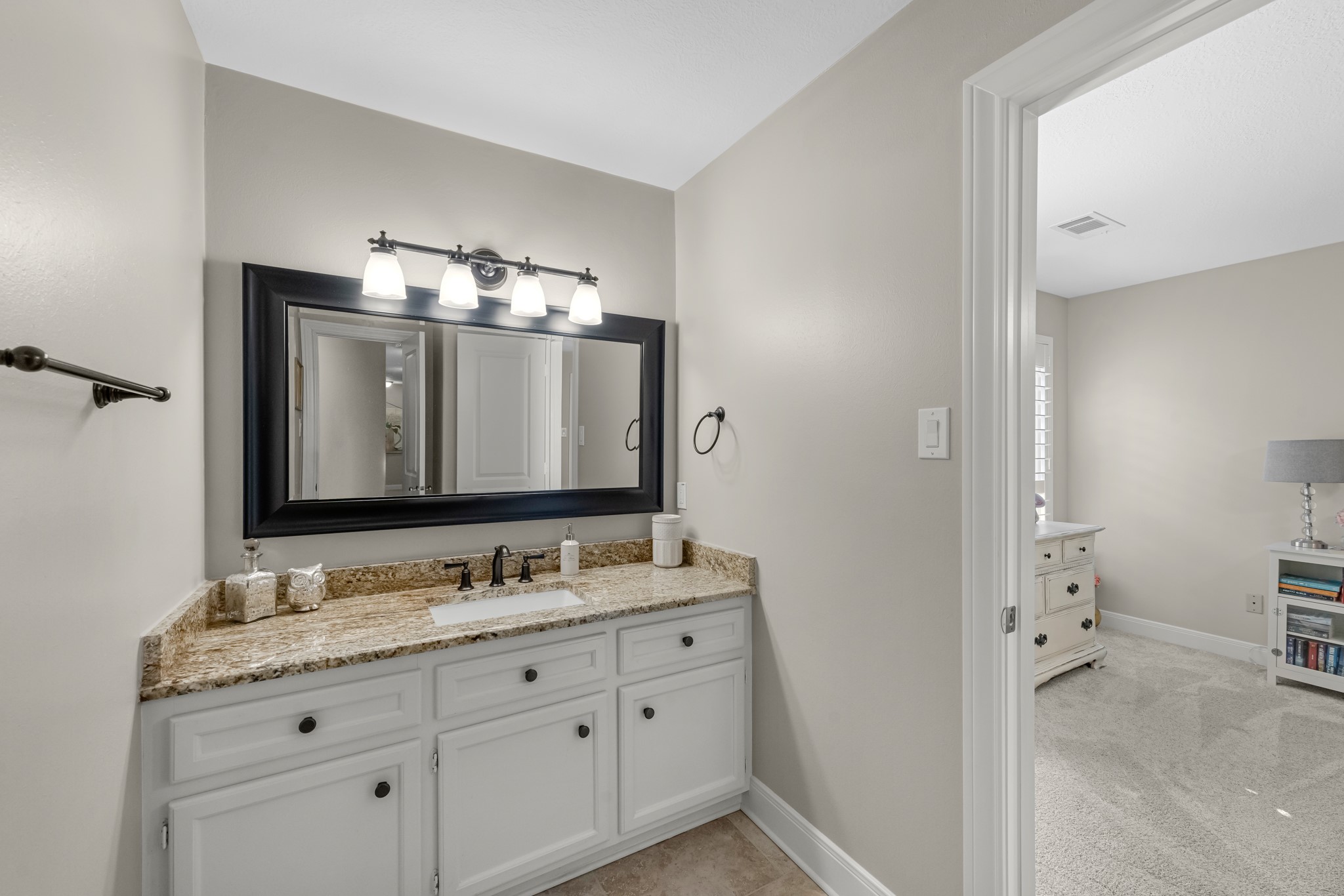 16207 Lafone Drive Spring, TX 77379 - Photo 42 of 49 a bathroom with a granite countertop double vanity sink mirror and
