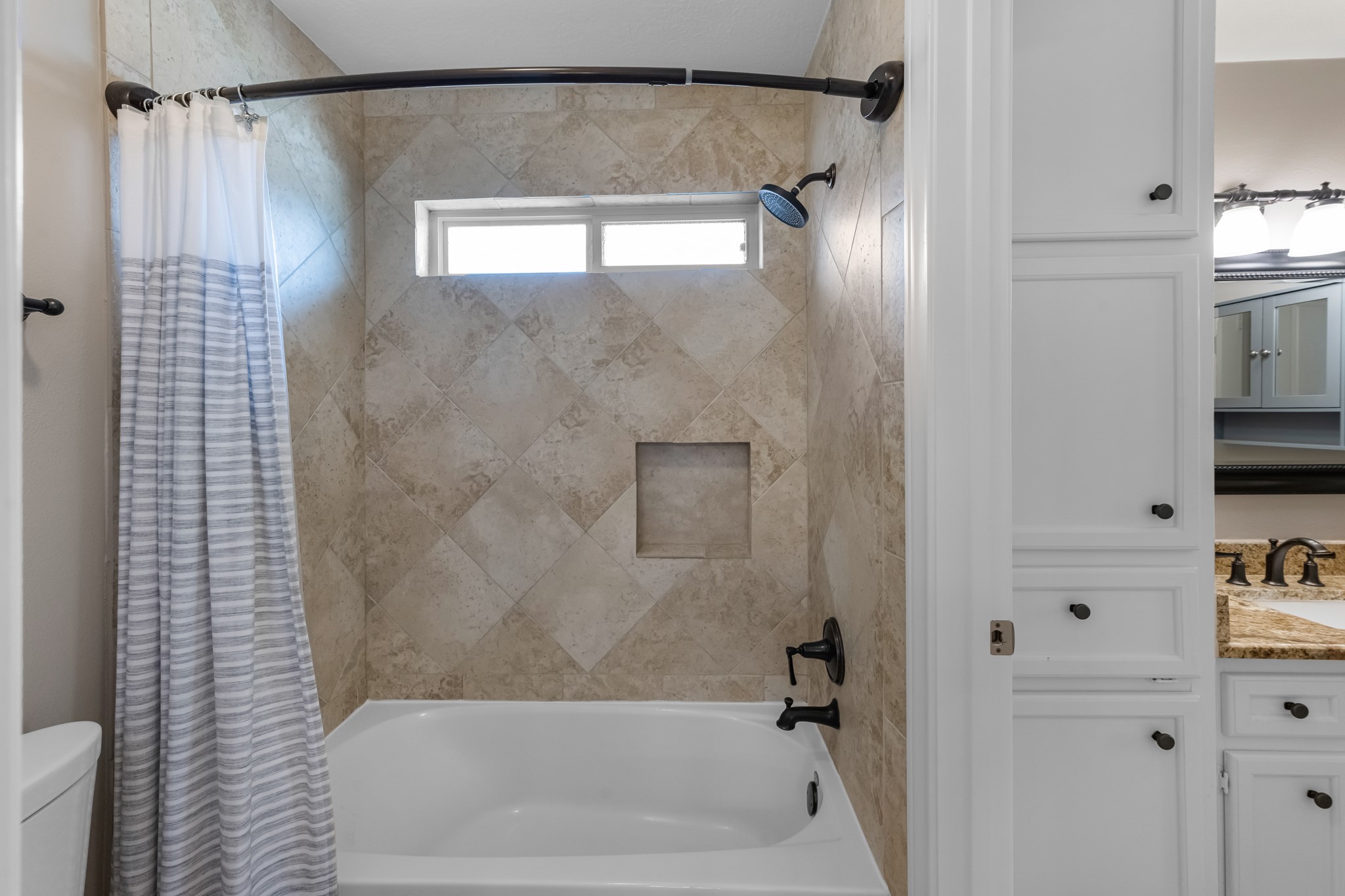 16207 Lafone Drive Spring, TX 77379 - Photo 45 of 49 a bathroom with a shower and a bath tub