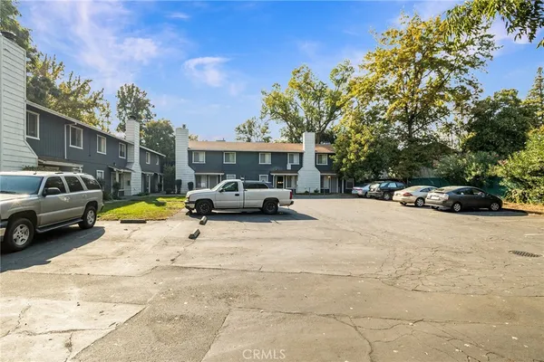 an aerial view of a house with outdoor space