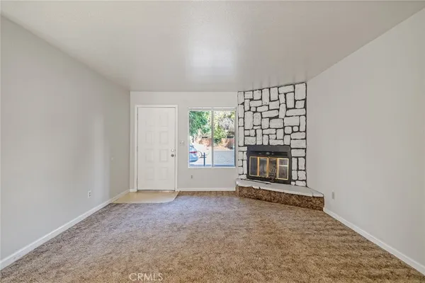 an empty room with entrance door