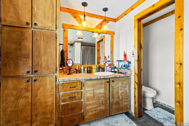 a work room with furniture and a window