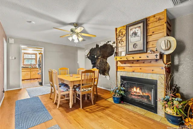a view of a livingroom with furniture and a flat screen tv