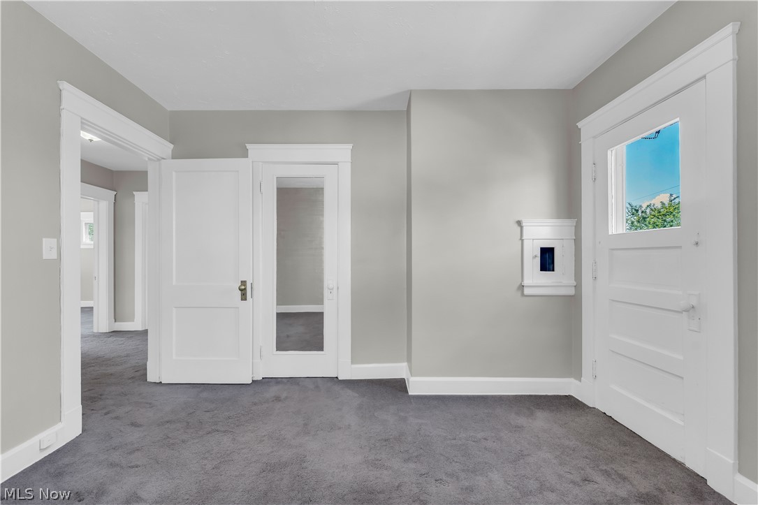 3506 Riverside Avenue Cleveland, OH 44109 - Photo 20 of 31 Interior room featuring gray wall paint and dark gray carpet flooring