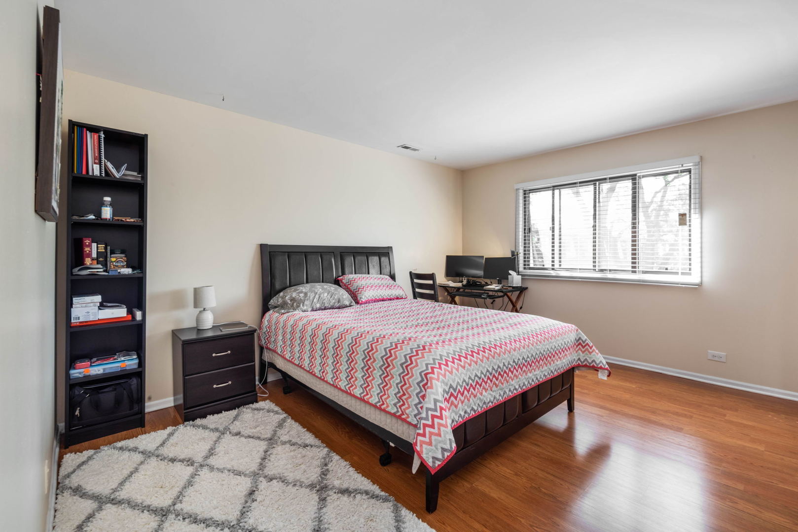 4180 Cove Lane, Unit C Glenview, IL 60025 - Photo 11 of 19 a bedroom with a bed and closet