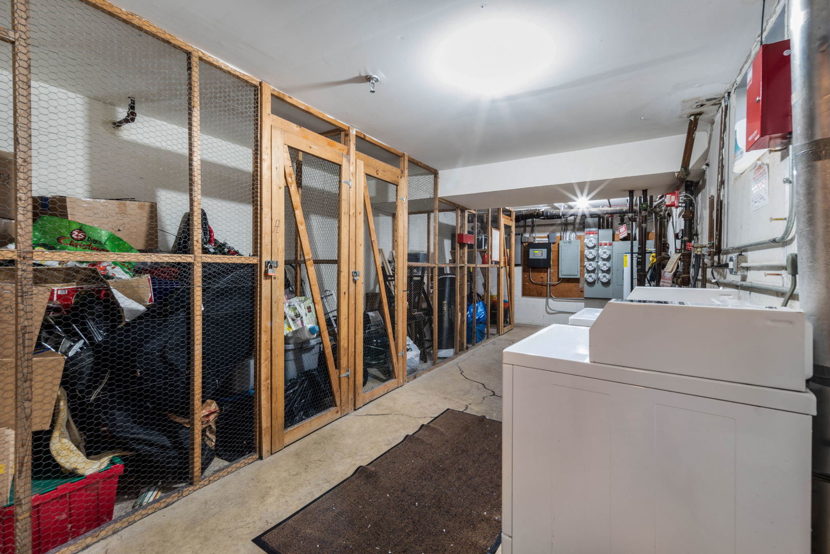 4180 Cove Lane, Unit C Glenview, IL 60025 - Photo 19 of 19 a view of walk in closet with clothes and shoes
