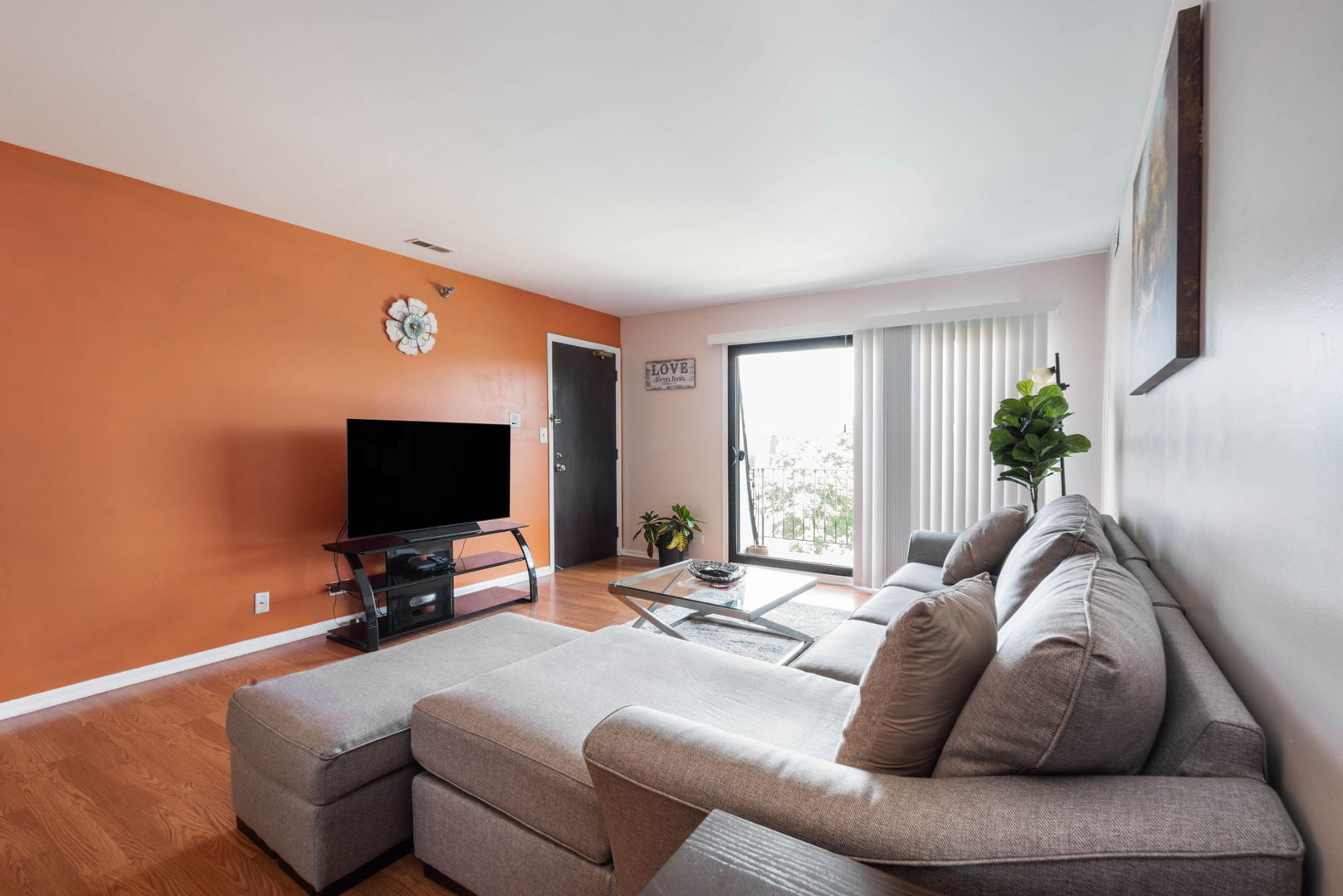 4180 Cove Lane, Unit C Glenview, IL 60025 - Photo 7 of 19 a living room with furniture and a flat screen tv