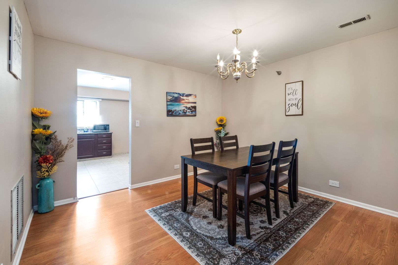 4180 Cove Lane, Unit C Glenview, IL 60025 - Photo 10 of 19 a view of a dining room with furniture and wooden floor