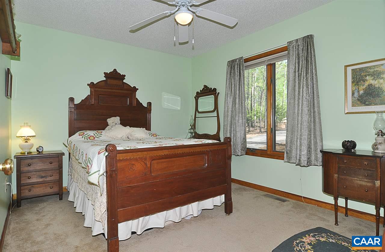 48 Oak Grove Road Palmyra, VA 22963 - Photo 23 of 36 a bed room with a bed and a window
