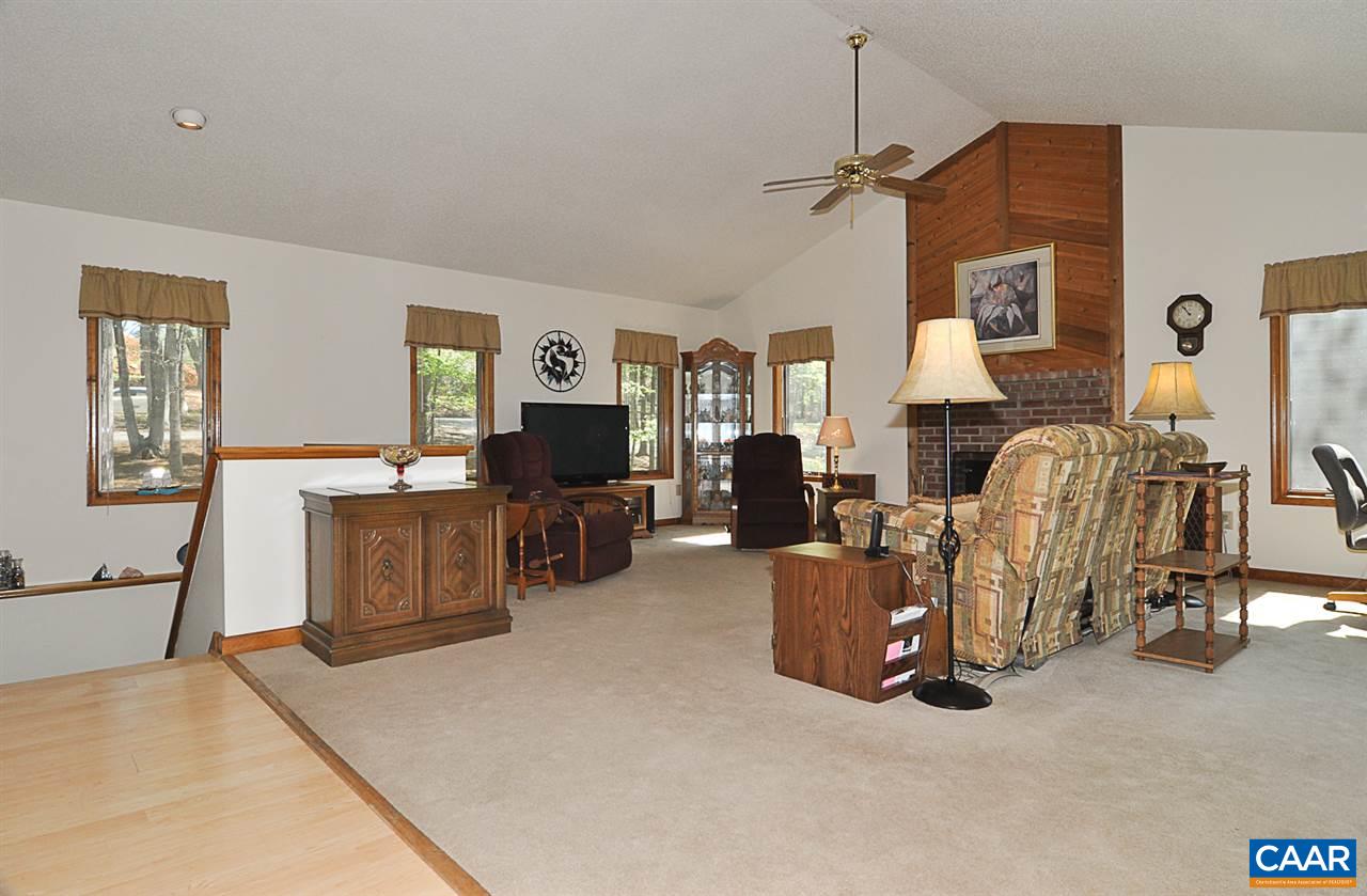 48 Oak Grove Road Palmyra, VA 22963 - Photo 3 of 36 a living room with furniture and a flat screen tv