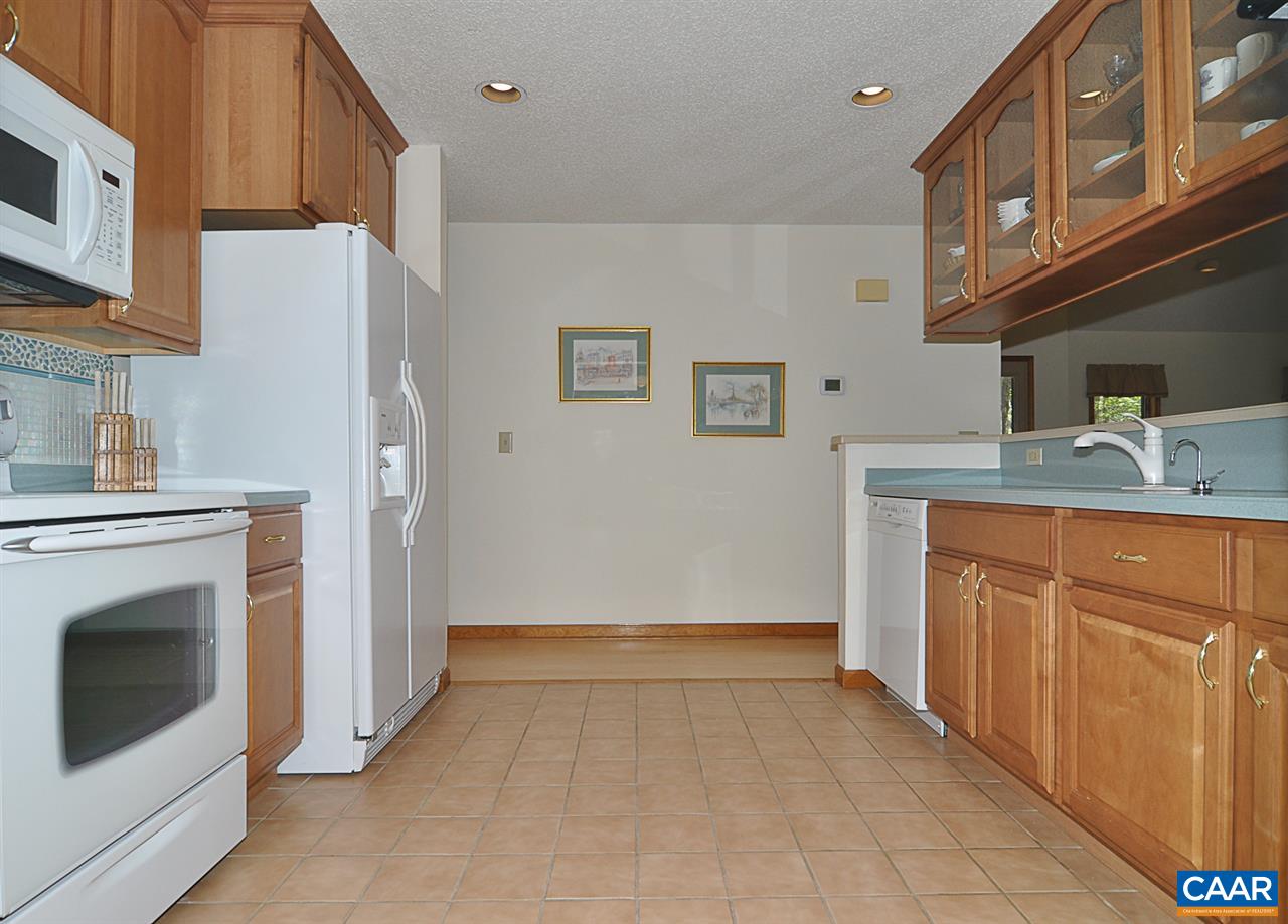 48 Oak Grove Road Palmyra, VA 22963 - Photo 10 of 36 a kitchen with stainless steel appliances granite countertop a refrigerator a stove and a sink