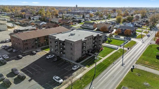 an aerial view of a house with a garden
