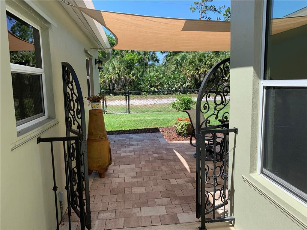 116 West Mango Road Lake Worth, FL 33467 - Photo 30 of 76 gate leading to backyard
