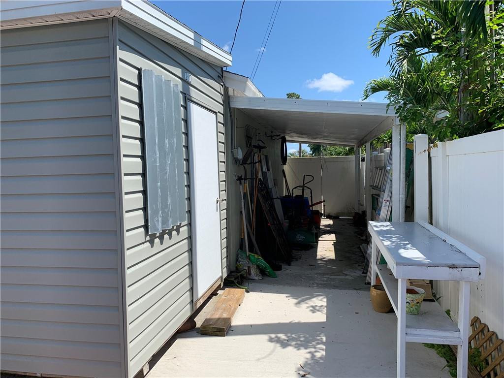 116 West Mango Road Lake Worth, FL 33467 - Photo 35 of 76 shed with extra covered storage