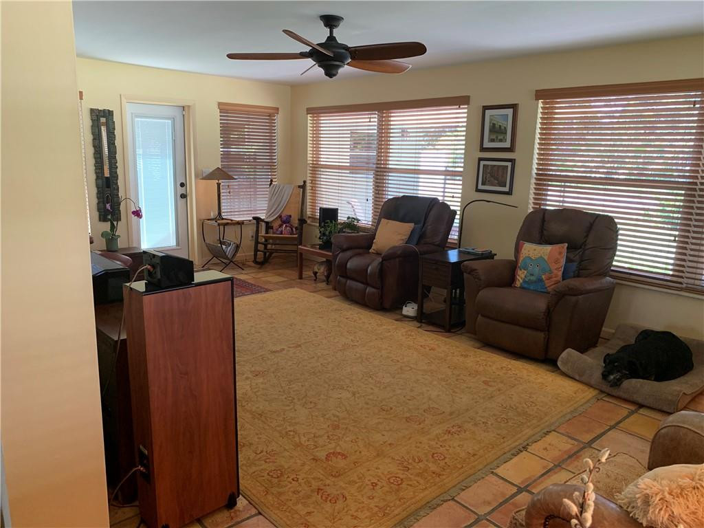 116 West Mango Road Lake Worth, FL 33467 - Photo 57 of 76 cozy large enclosed florida room