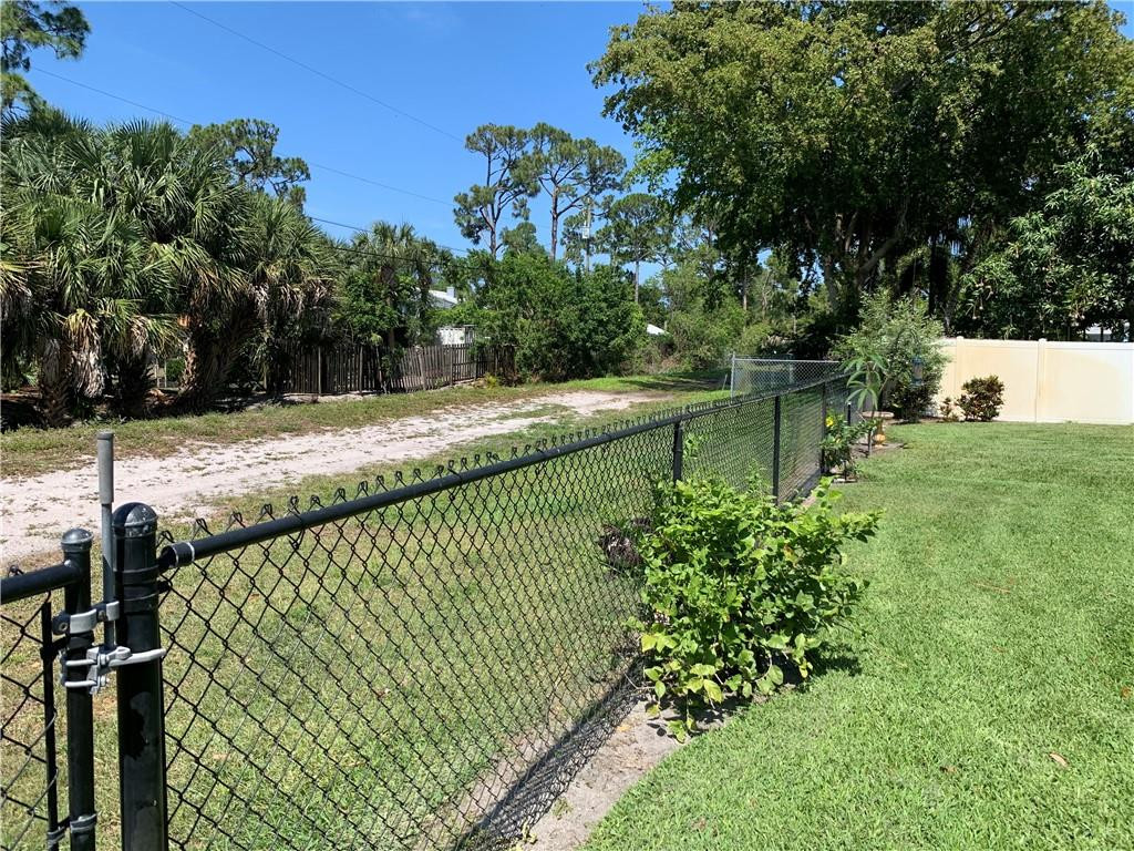 116 West Mango Road Lake Worth, FL 33467 - Photo 75 of 76 canal/fenced yard