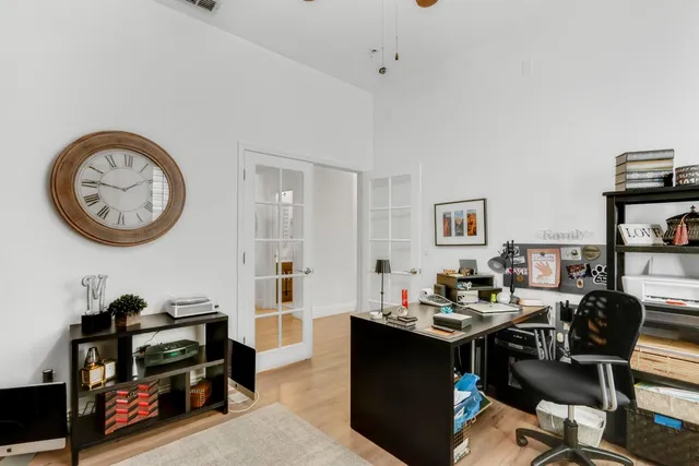 a bedroom with a bed and a couch