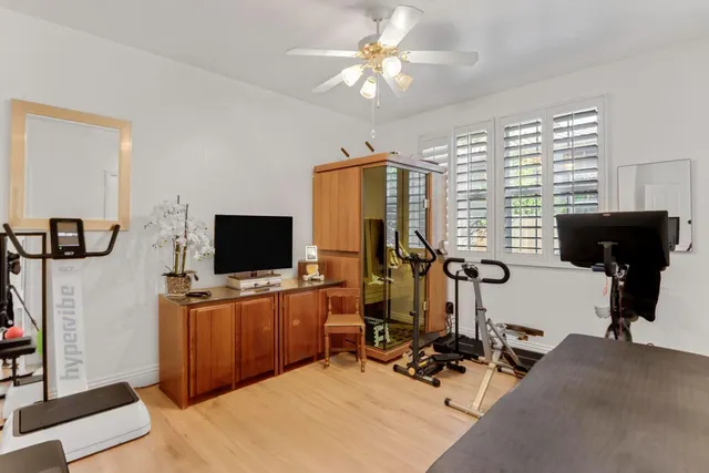 a bathroom with a sink vanity and a mirror
