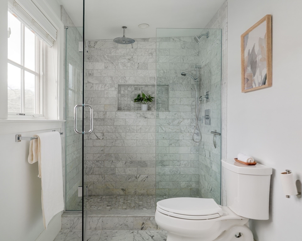 6 Hamilton Road, Unit 6 Somerville, MA 02144 - Photo 24 of 28 a bathroom with a toilet and shower