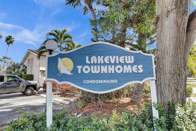 a sign on the side of the road