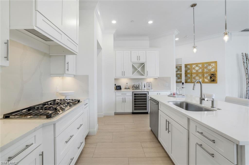 16374 Viansa Way, Unit 5302 Naples, FL 34110 - Photo 5 of 28 Natural gas cooking, wine cooler