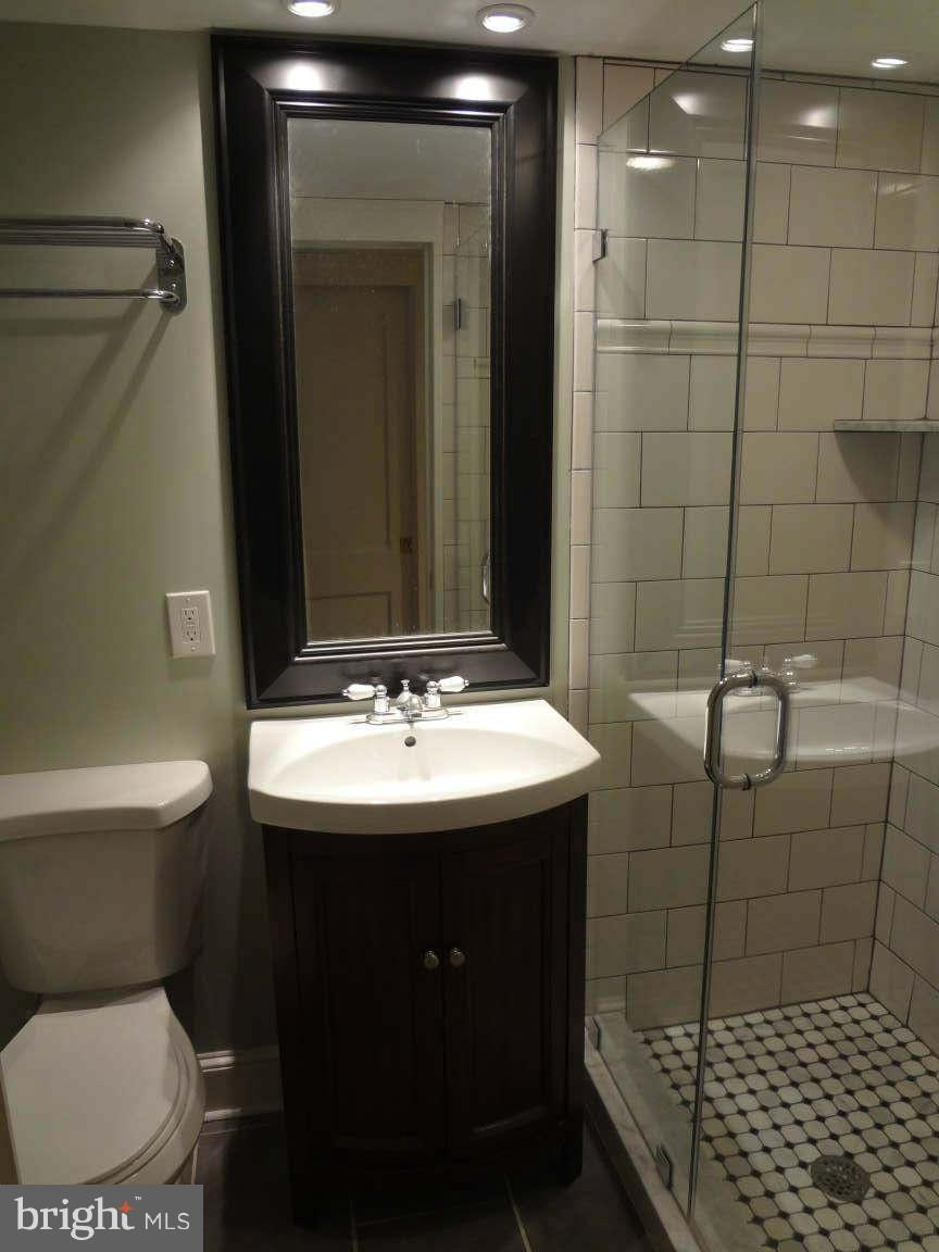 3037 Keswick Road Baltimore, MD 21211 - Photo 28 of 30 LL Full Bath w/ Frameless Glass & Tile Shower