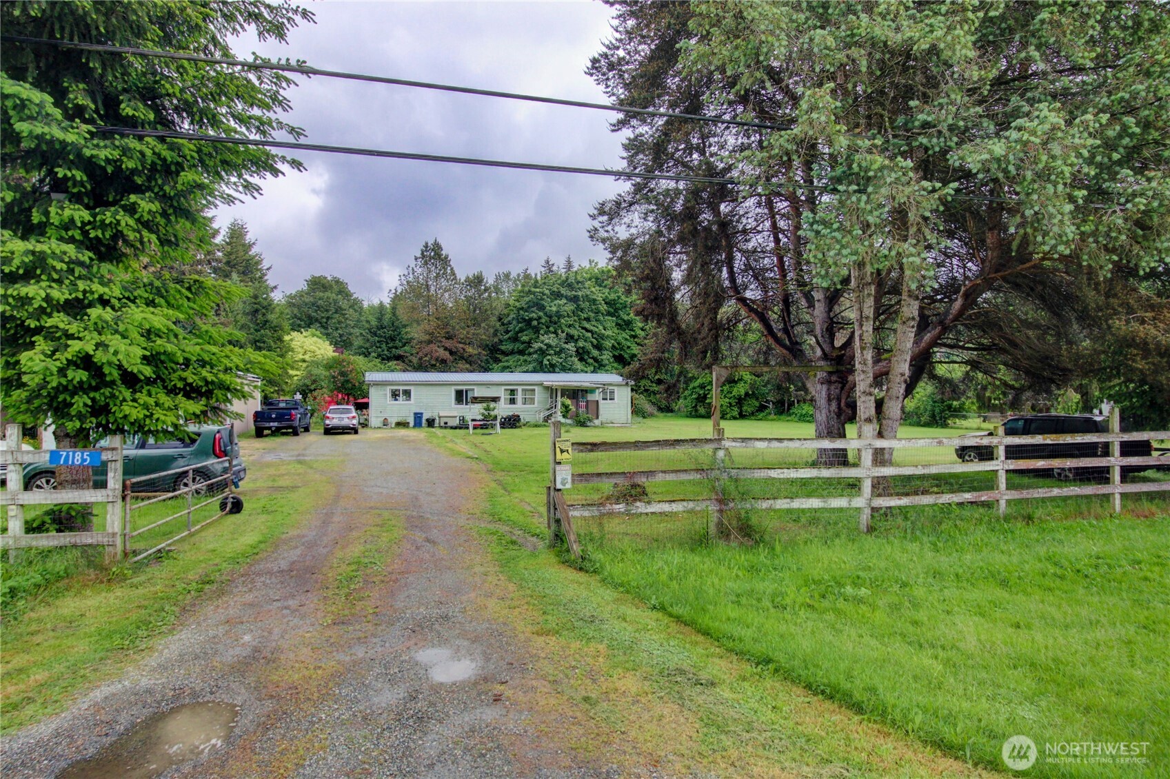 7185 Old Highway 99 North Road Burlington, WA 98233 - Photo 3 of 26 a view of a park with large trees