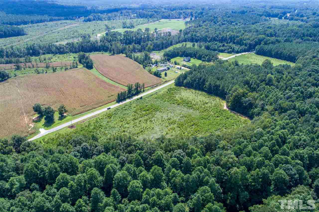 A Bart Road Middlesex, NC 27557 - Photo 3 of 24 an aerial view of a house with yard and outdoor seating