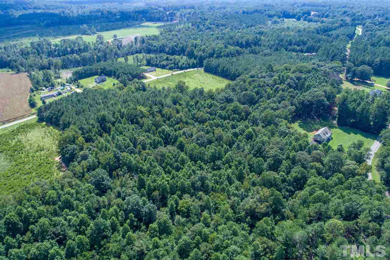 A Bart Road Middlesex, NC 27557 - Photo 7 of 24 an aerial view of a house with a lush green forest