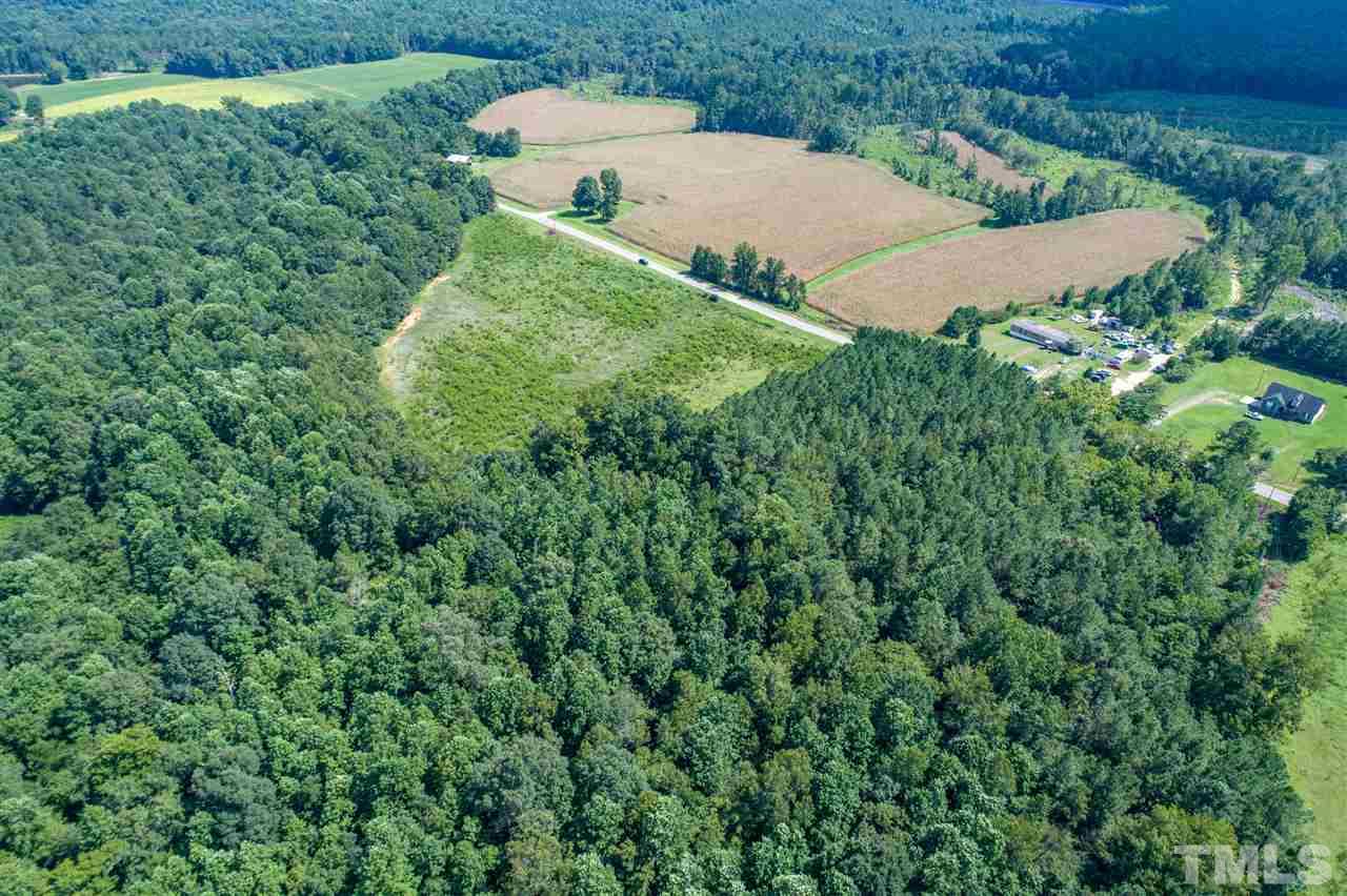A Bart Road Middlesex, NC 27557 - Photo 8 of 24 a view of a green yard with large trees