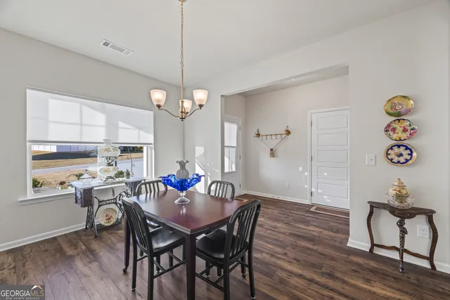 a white bath tub sitting next to a window