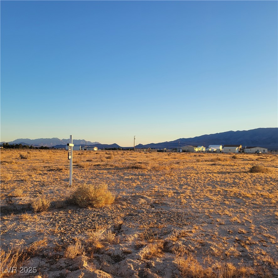 1971 Keith Street Pahrump, NV 89048 - Photo 2 of 7 View of mountain backdrop featuring rural desert landscape