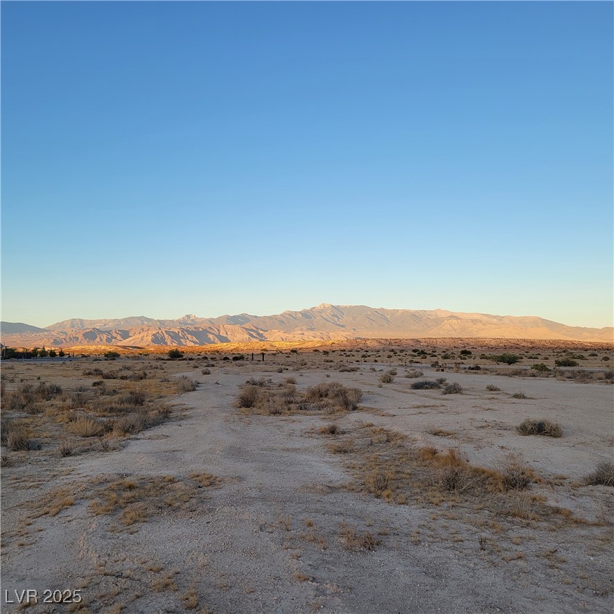 1971 Keith Street Pahrump, NV 89048 - Photo 3 of 7 View of picturesque mountain range to the East (Back side of Mt Charleston)