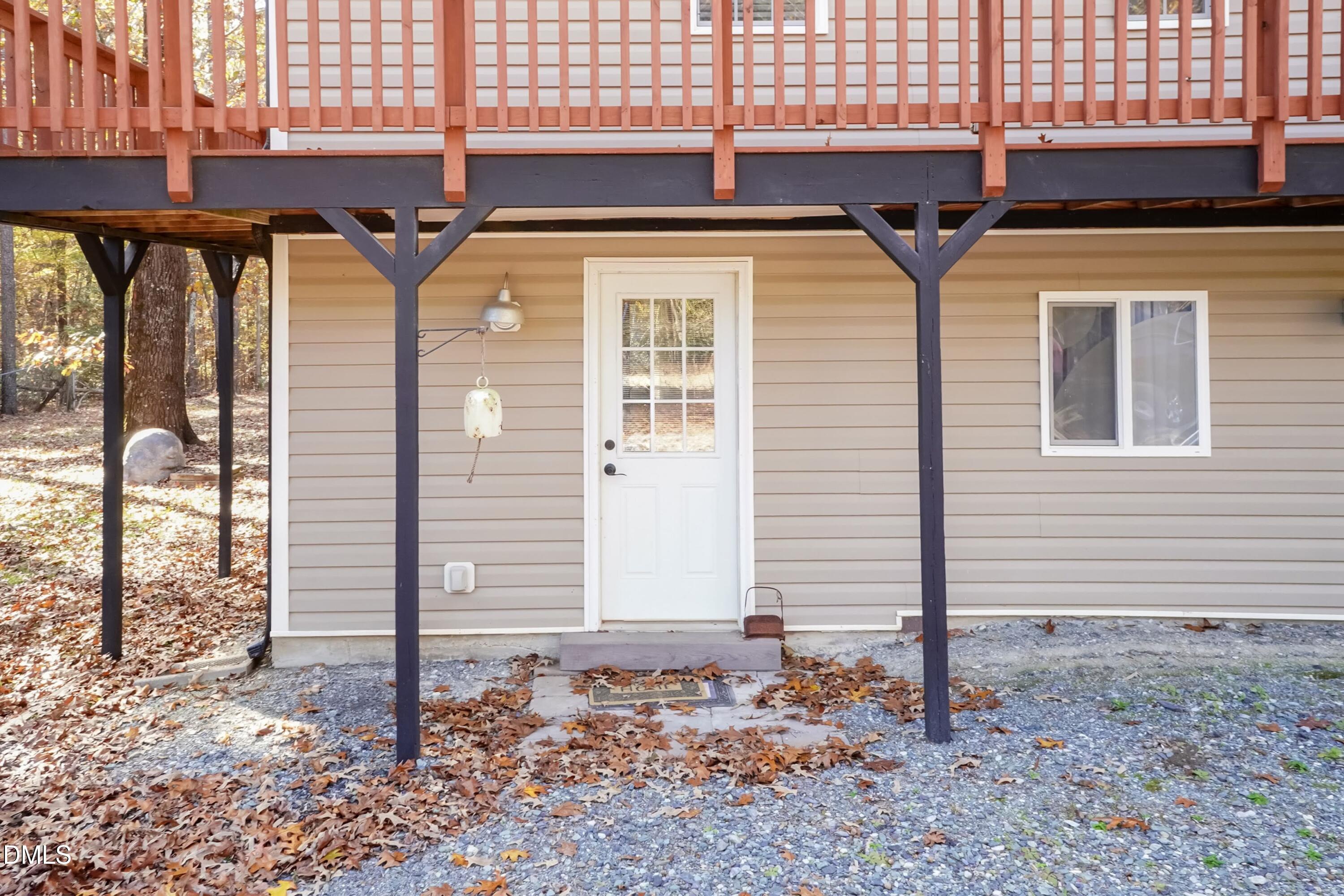 137 Fox Hunters Lane Broadway, NC 27505 - Photo 25 of 46 a front view of a house with a yard