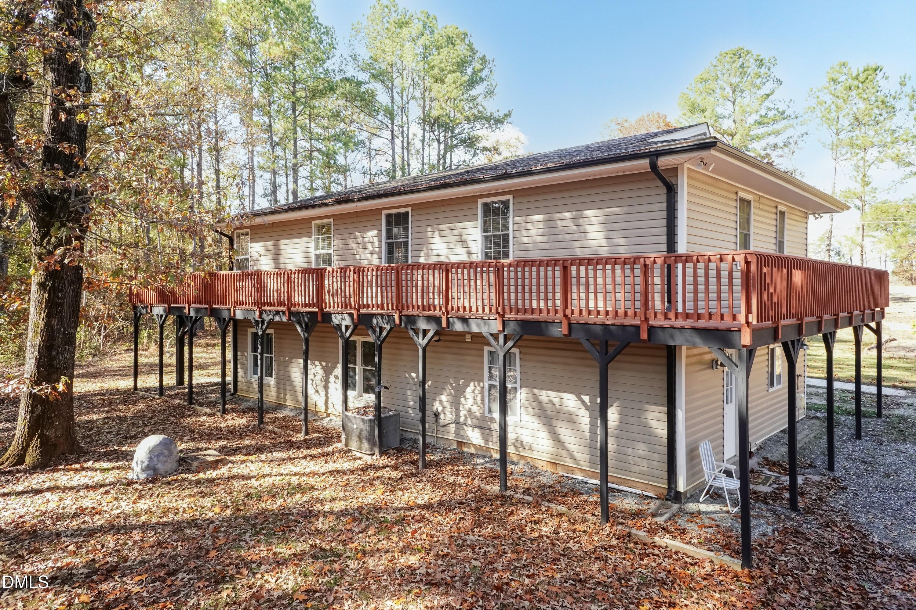 137 Fox Hunters Lane Broadway, NC 27505 - Photo 45 of 46 a front view of a house with garden