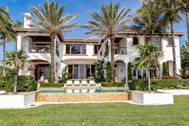 a living room with furniture fireplace and flat screen tv