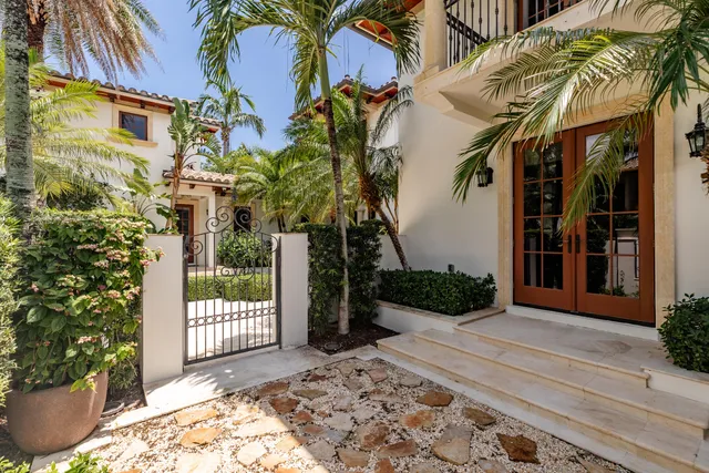 a view of a large mirror and furniture