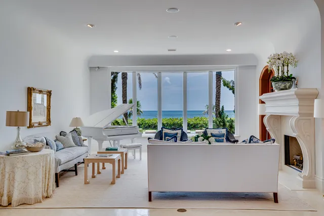 a kitchen with stainless steel appliances a sink a stove and a wooden floors