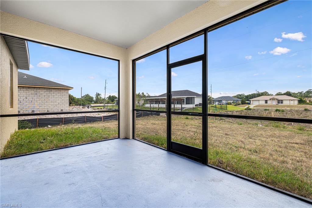 4909 Berryman Street Lehigh Acres, FL 33971 - Photo 23 of 30 View of unfurnished sunroom