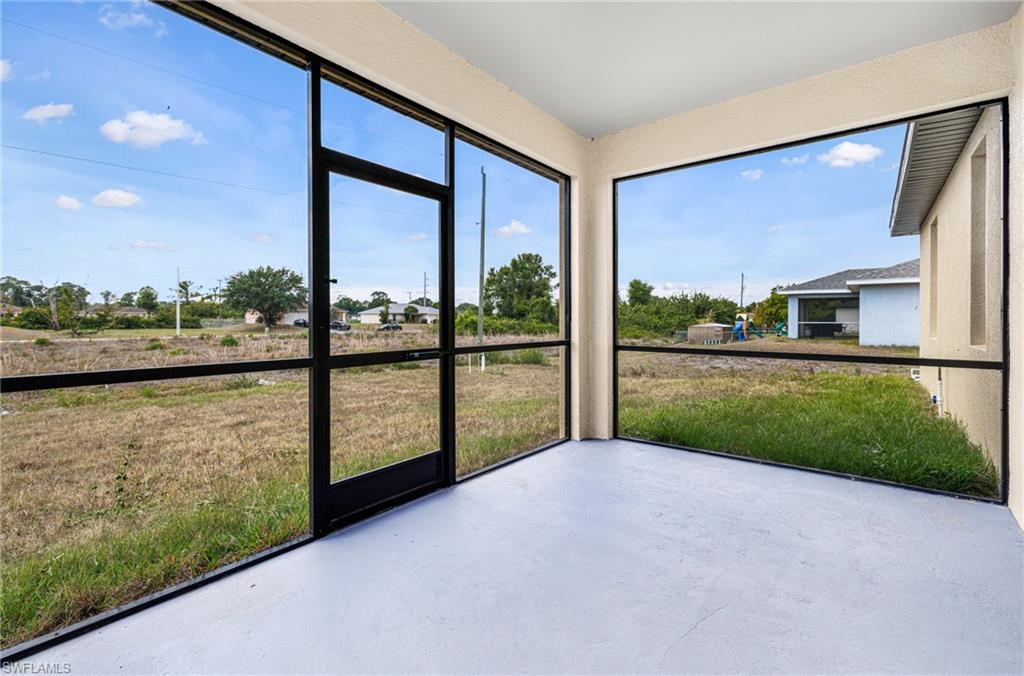 4909 Berryman Street Lehigh Acres, FL 33971 - Photo 24 of 30 View of unfurnished sunroom