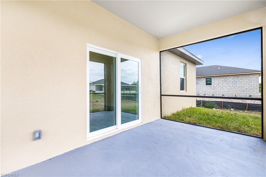 4909 Berryman Street Lehigh Acres, FL 33971 - Photo 25 of 30 View of unfurnished sunroom