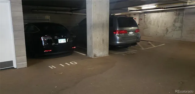a view of empty room with floor to ceiling window